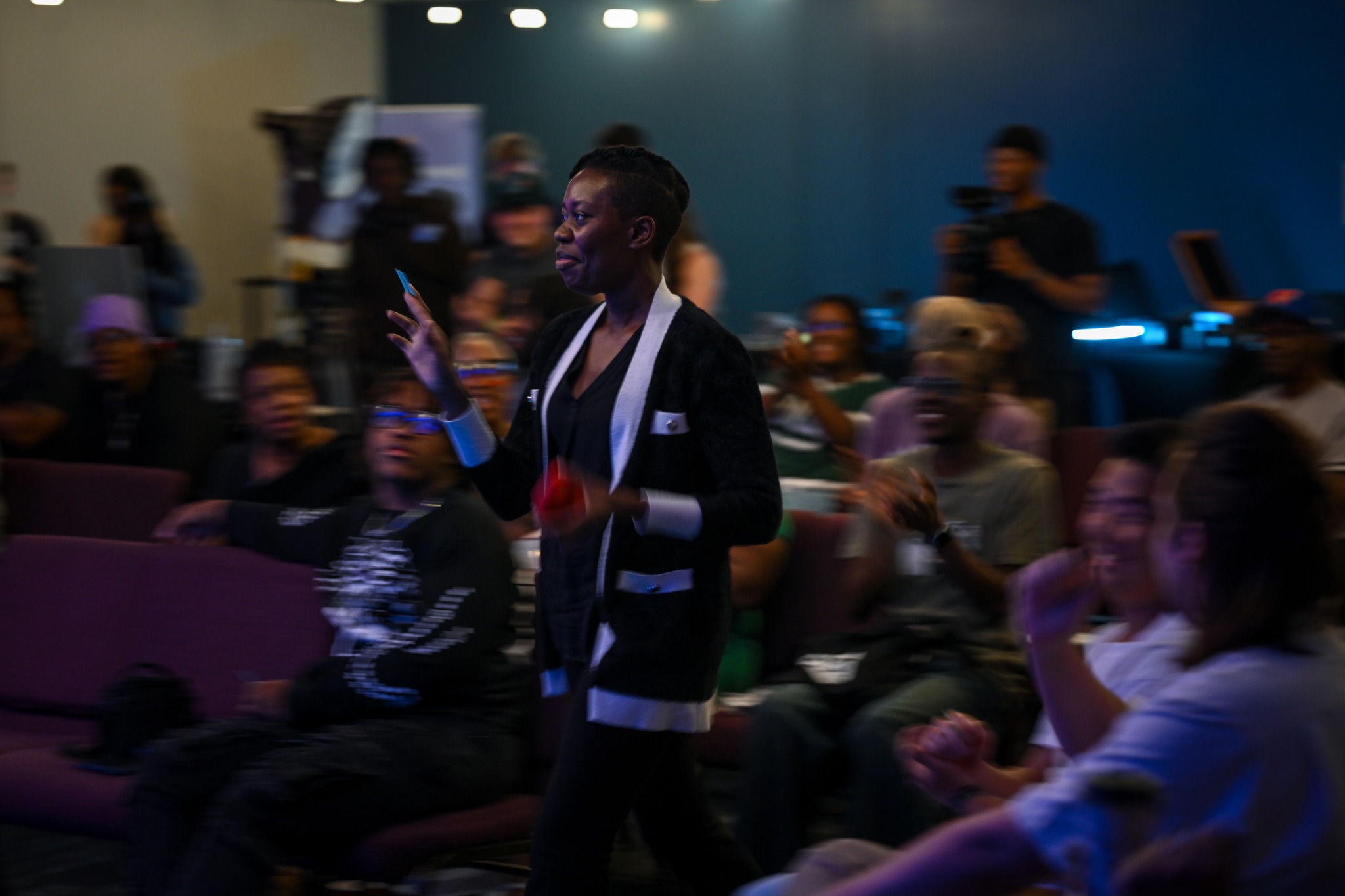 A brand representative answering questions from church creatives