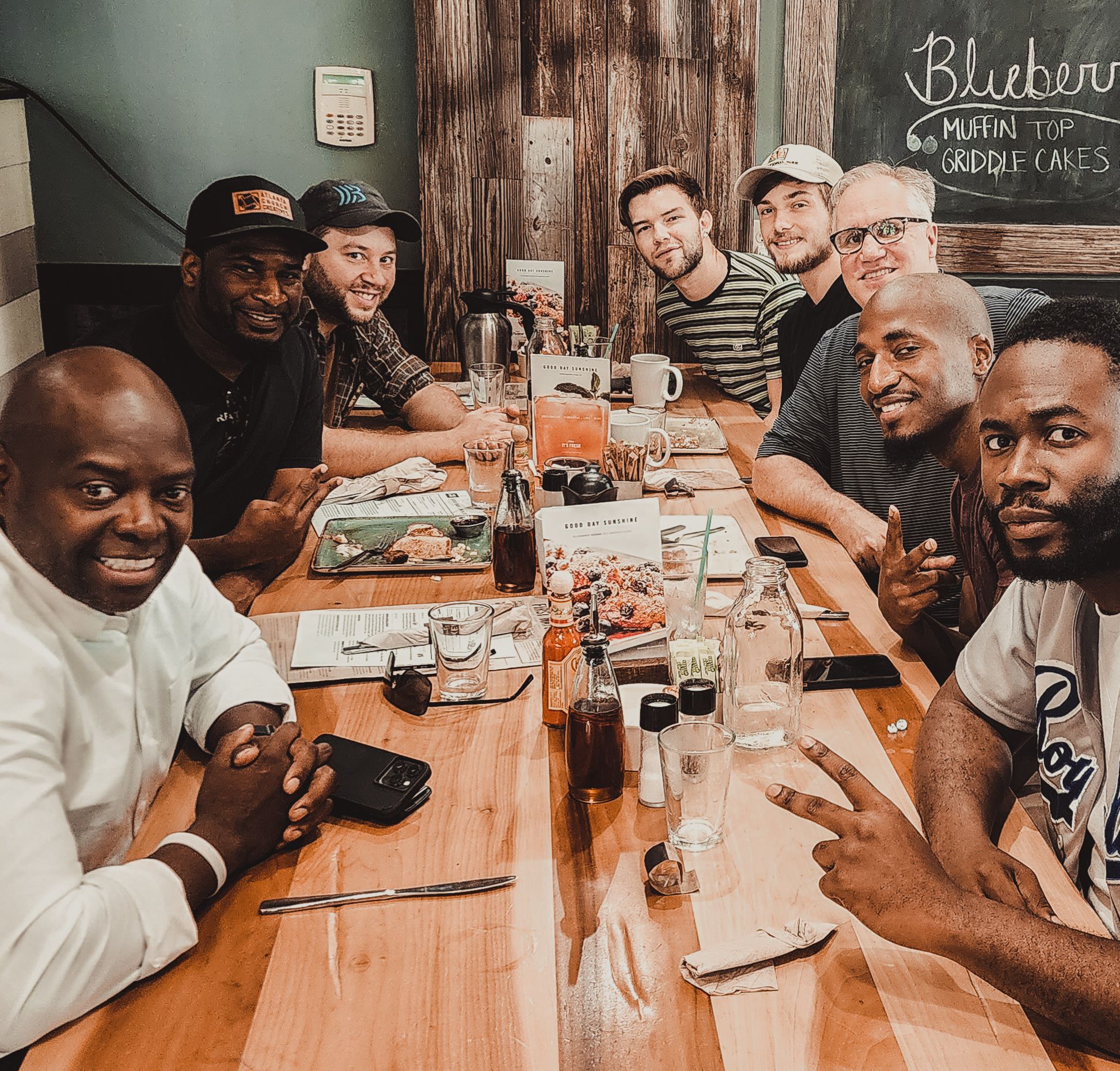 Church creatives sharing breakfast and conversation around a table