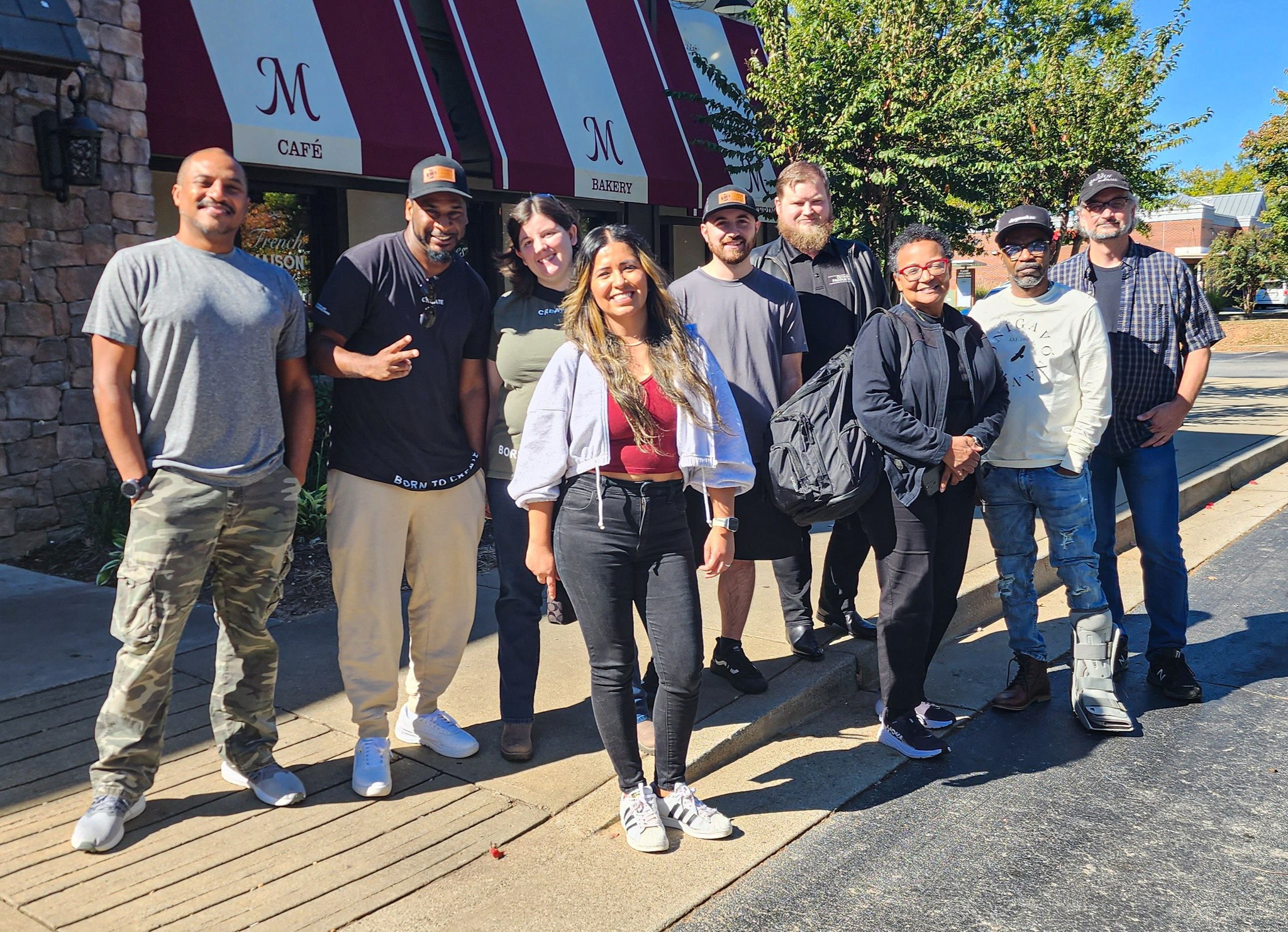 A diverse group of church creatives at a Monday Breakfast Meetup
