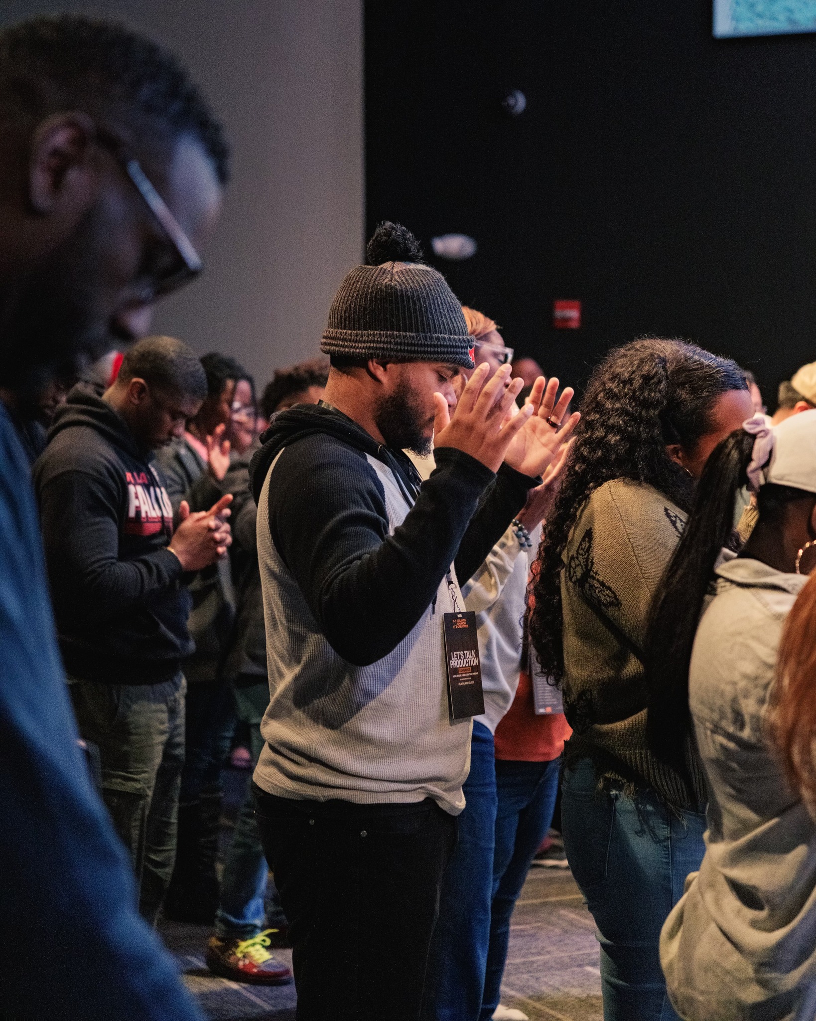 Conference attendees connecting through prayer
