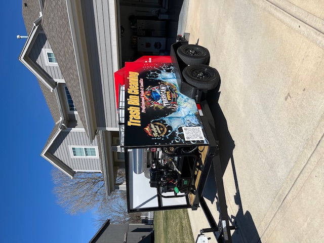 Trash Can Pros KC cleaning truck with self contained hot water bin sanitizing system