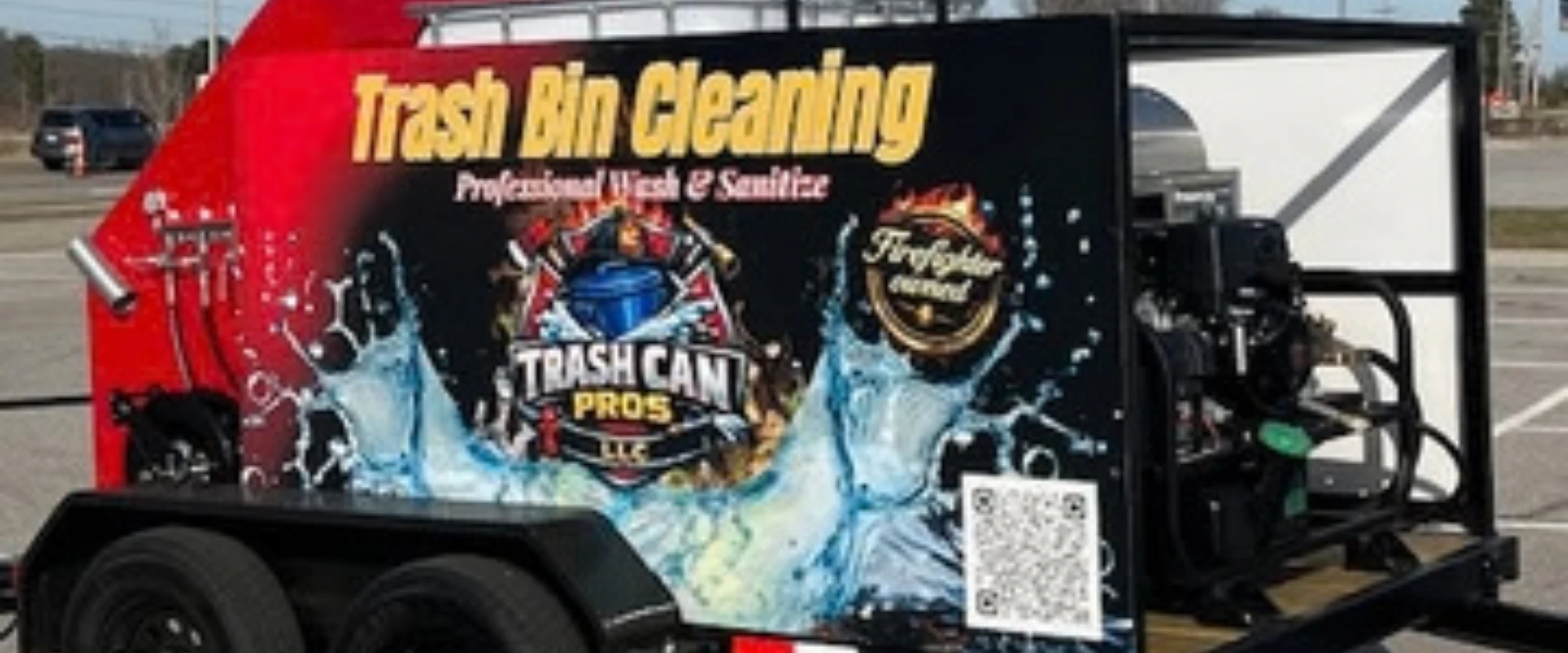 A black and red trailer advertising 'Trash Bin Cleaning' and 'Trash Can Pros LLC' with water splash graphics, a 'Firefighter owned' badge, and a QR code.