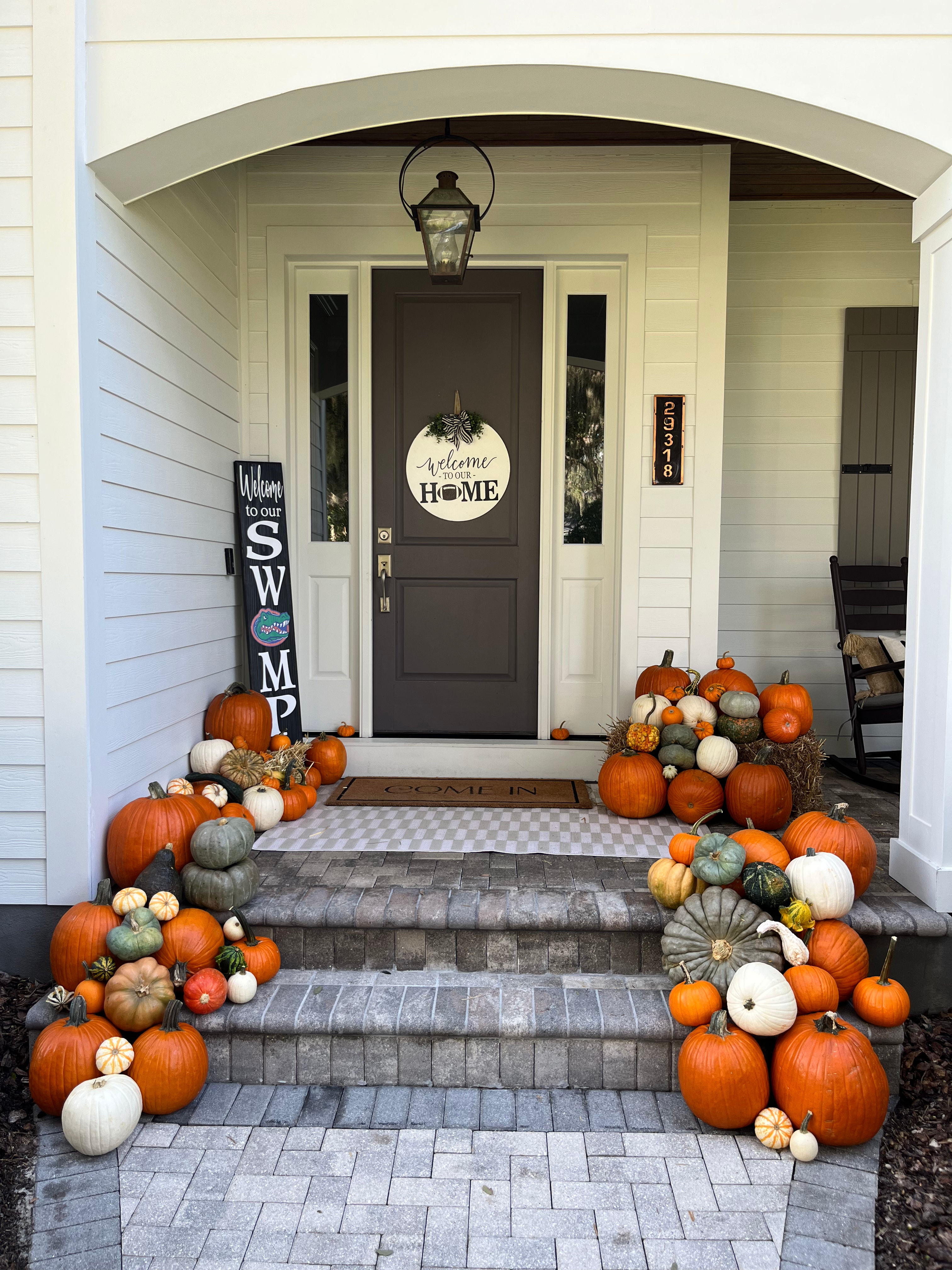 The Joyous Harvest styled on a front entry