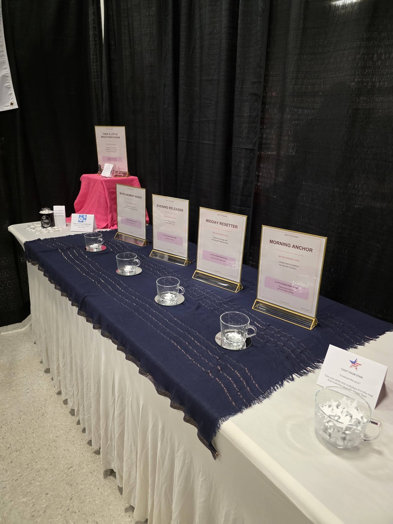 Interactive De-Stress Type activity and breathing-room resources displayed at the Beauty That Blesses community expo booth. Interactive De-Stress Type activity and breathing-room resources displayed at the Beauty That Blesses community expo booth.