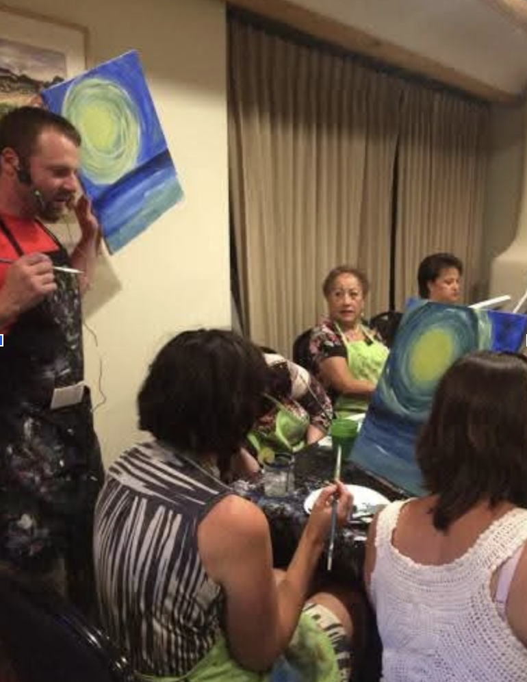 Tyler teaching a painting class