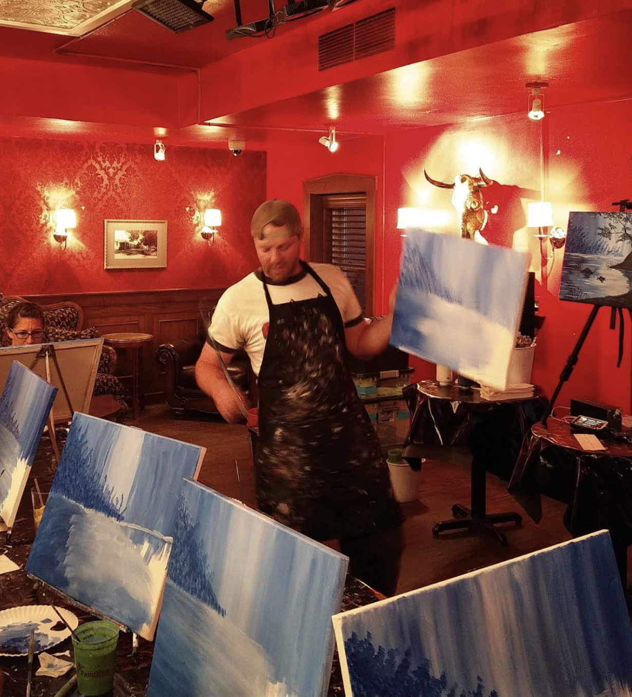 Tyler Smith teaching a Wonderfully Made painting class