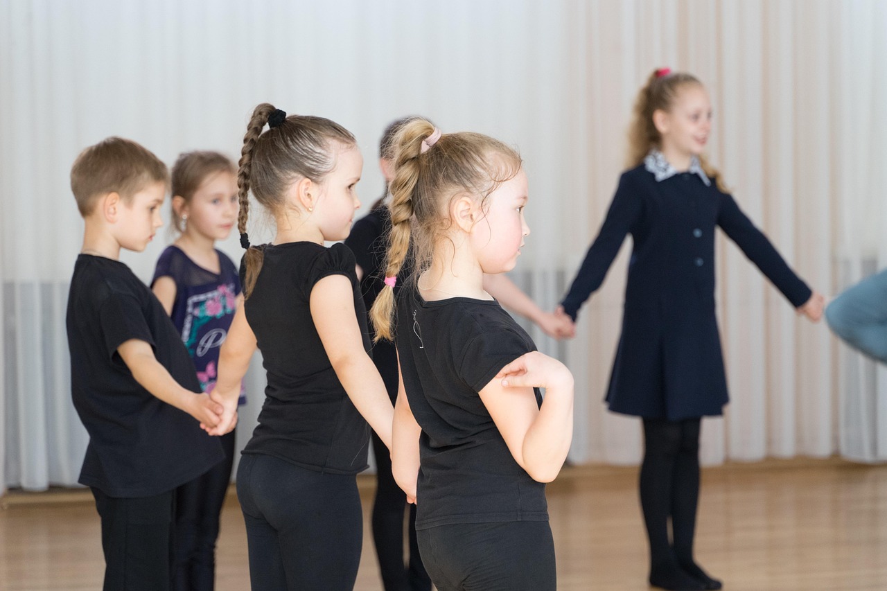 Junior Ballroom students participating in a dance class at The Phoenix Ballroom Academy in Chandler, Arizona.