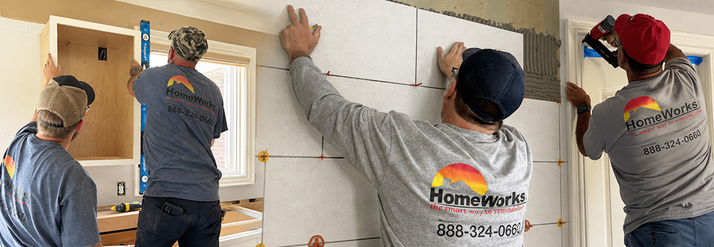 HomeWorks crew installing cabinetry in a Macomb County home