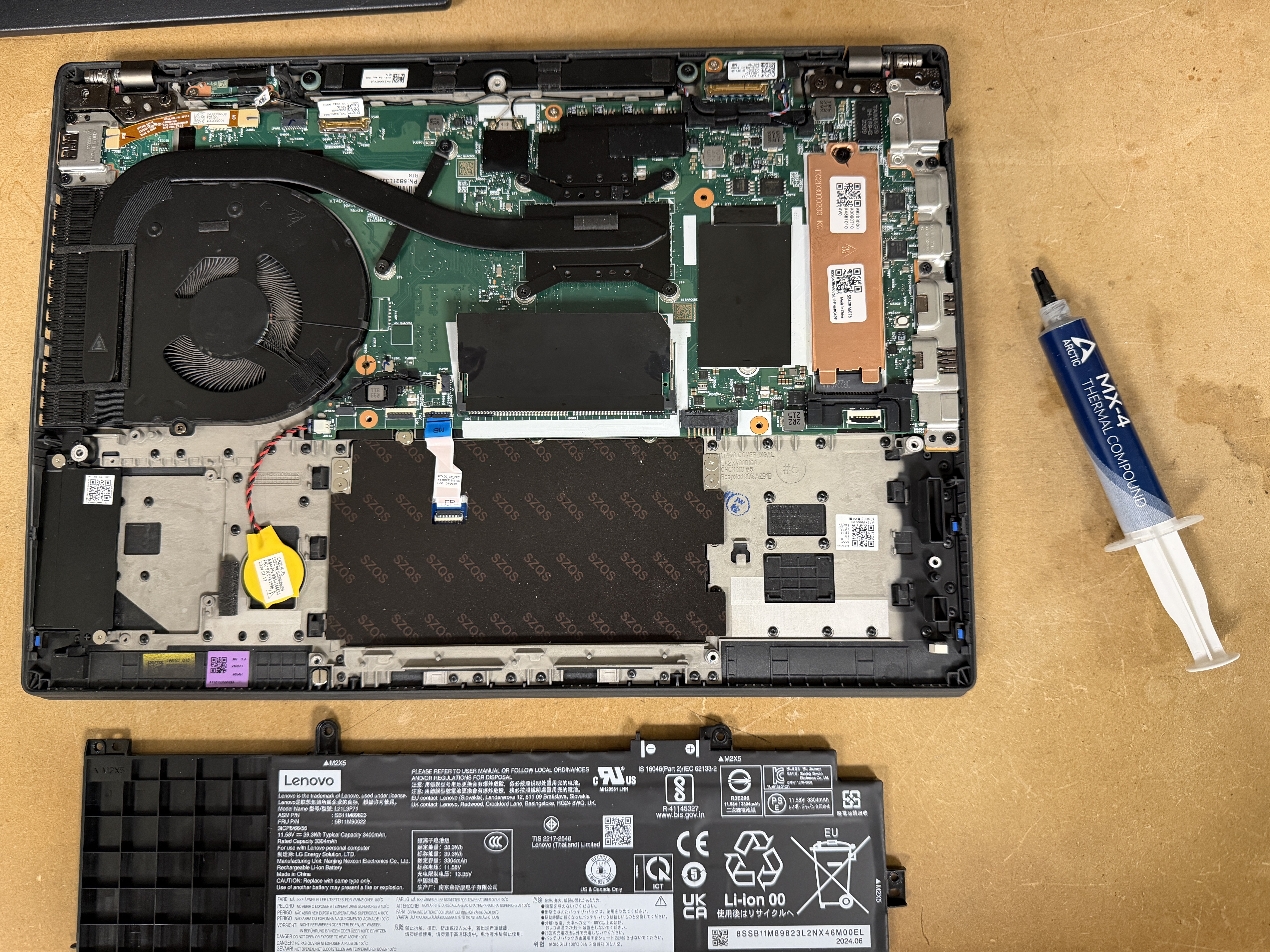 Expert technician at Priority 1 Computer Service replacing a Lenovo ThinkPad motherboard in Victoria, BC