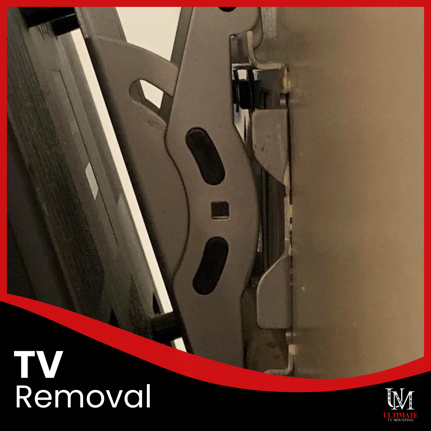 Technician moving or remounting an existing television