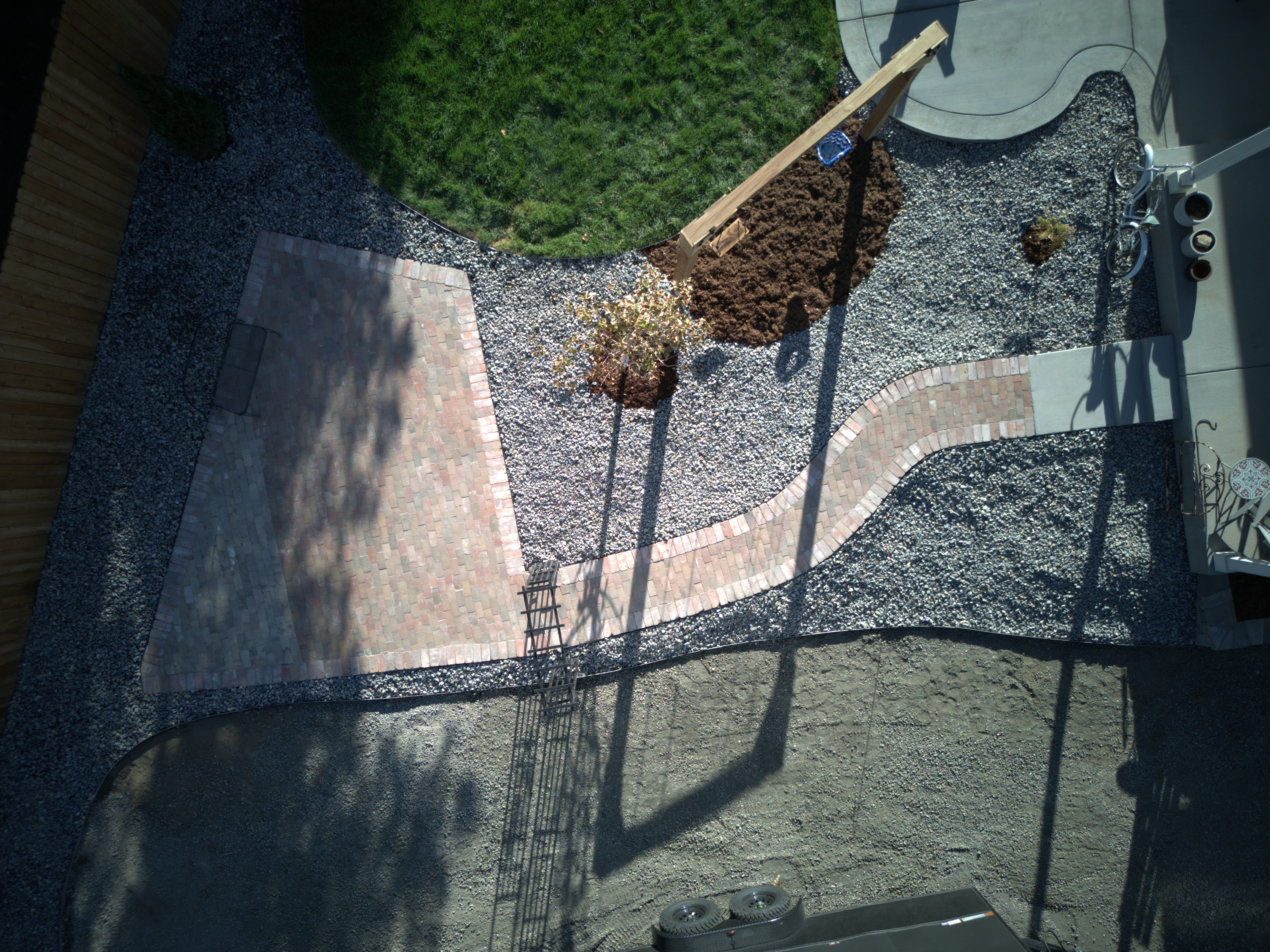 Aerial drone view of a completed Turf Talent backyard landscape
