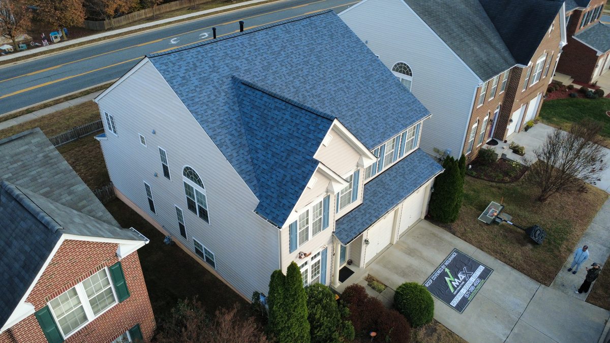Architectural shingle and metal roof replacement