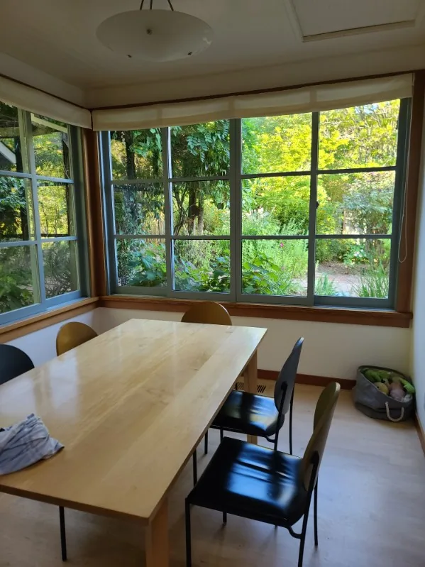 Hugo's Services — Dining area with a large window