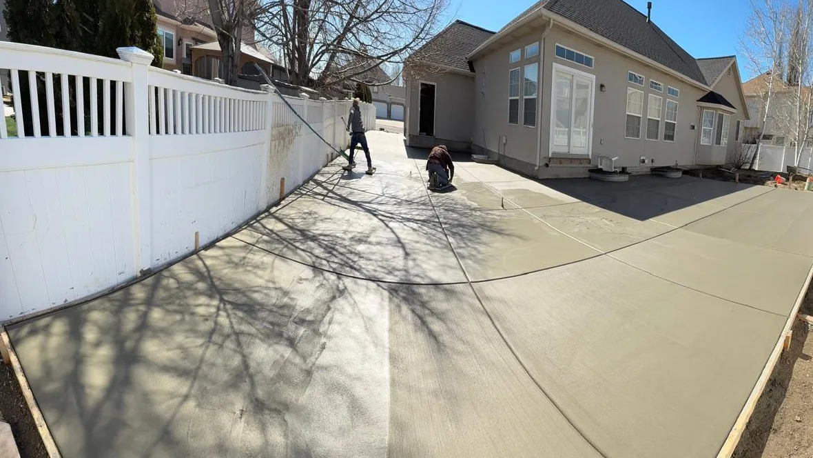 Great Rock crew finishing a large residential concrete patio