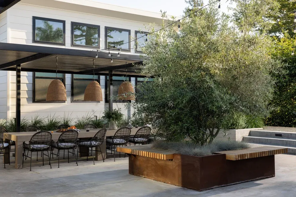 Modern accessory dwelling unit beside a landscaped courtyard