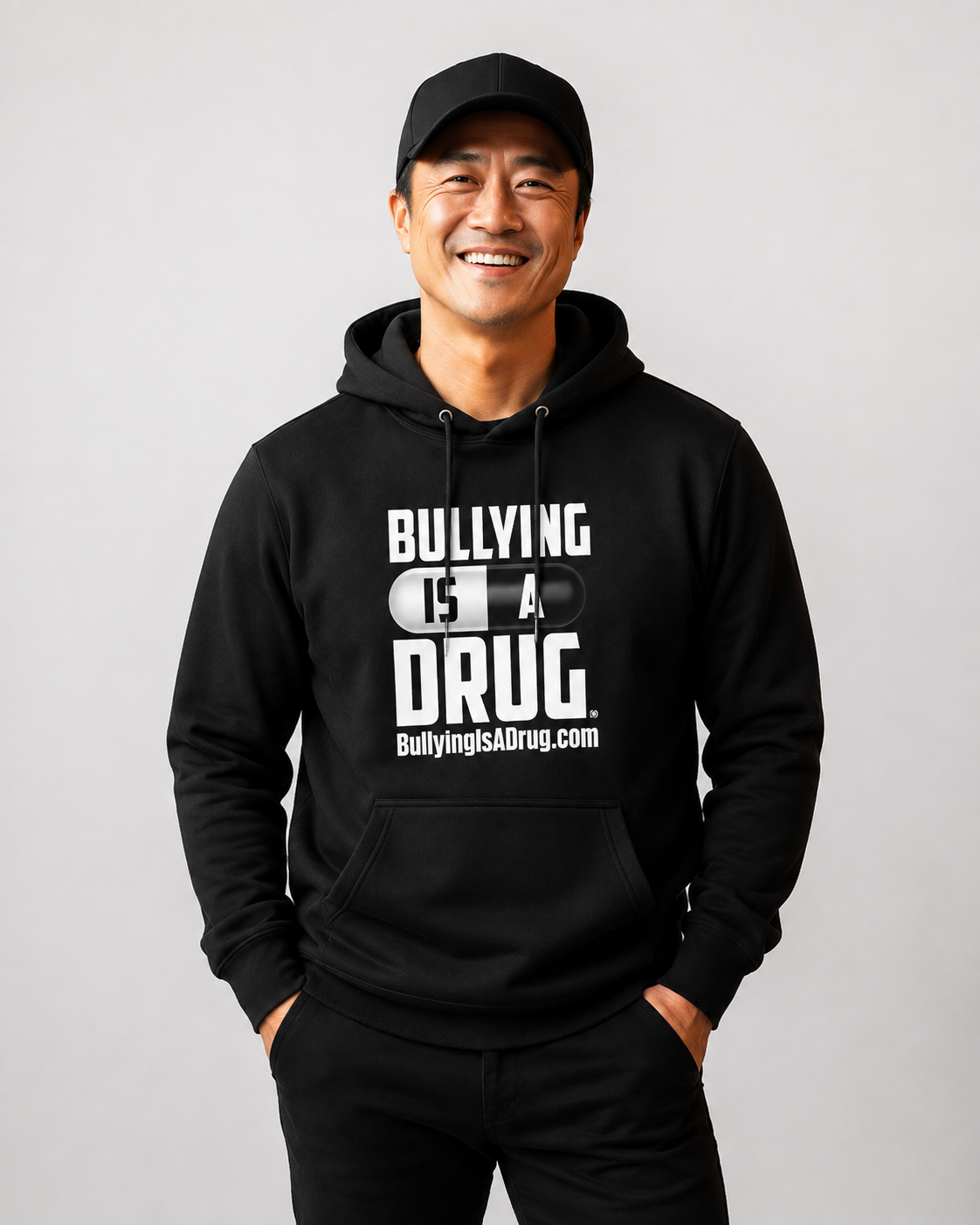 Bullying Is a Drug hoodie — front, worn by male model