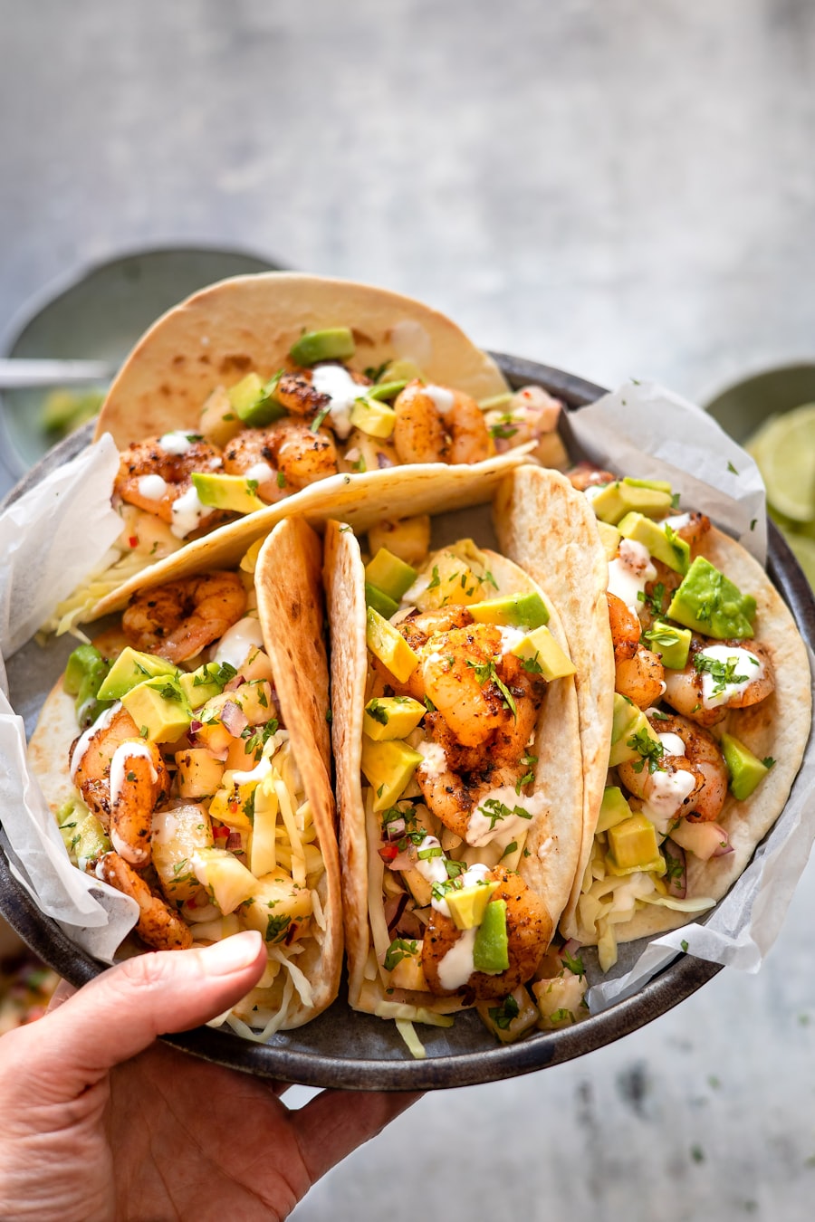 Grilled shrimp tacos with pico de gallo and crema