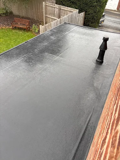 Roof refurbishment with new tiles and flashing