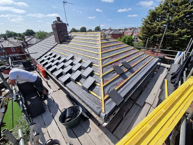 Completed residential roof with finished flashings