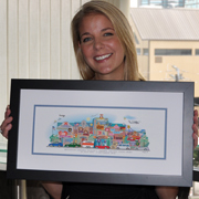 A young woman smiling with her 5-building anniversary print