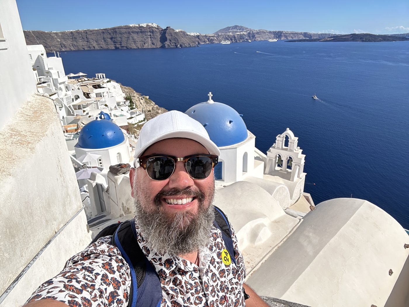 Jon above the blue domes of Oia