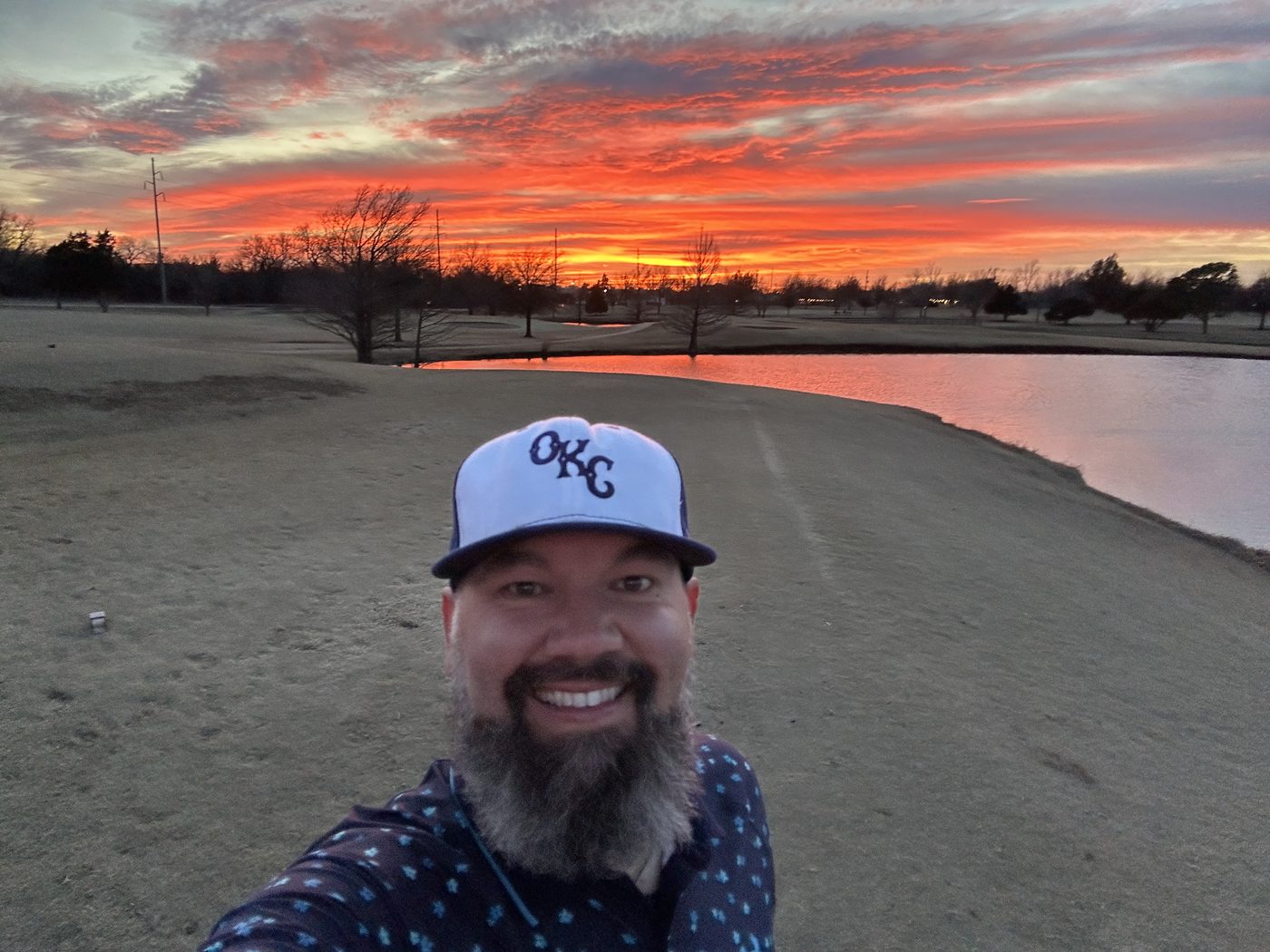Jon on the golf course at sunset