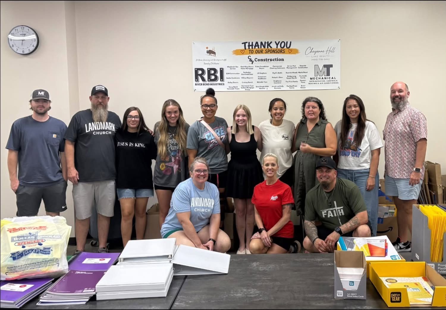 7z team members and volunteers at the Back-to-School Blessings supply giveaway