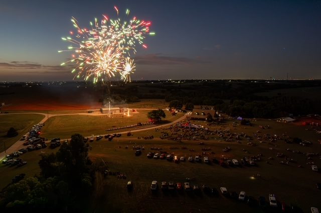 Fireworks lighting up the night sky over the celebration