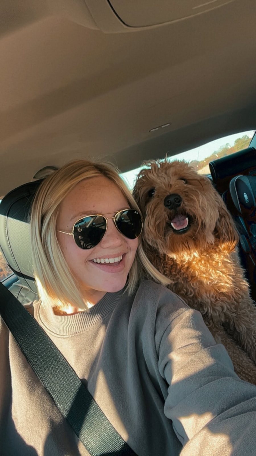 Cheyanne on a road trip with one of her dogs