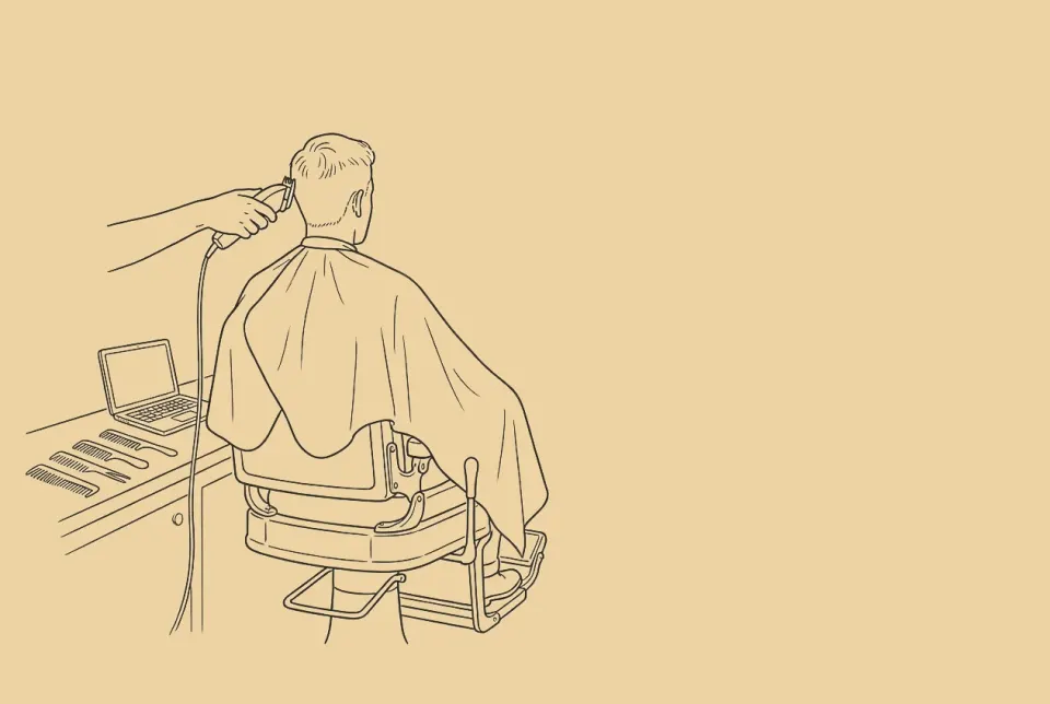 An ink drawing of a barber chair mid-cut, clippers in a hand at the edge, a laptop open on the counter.