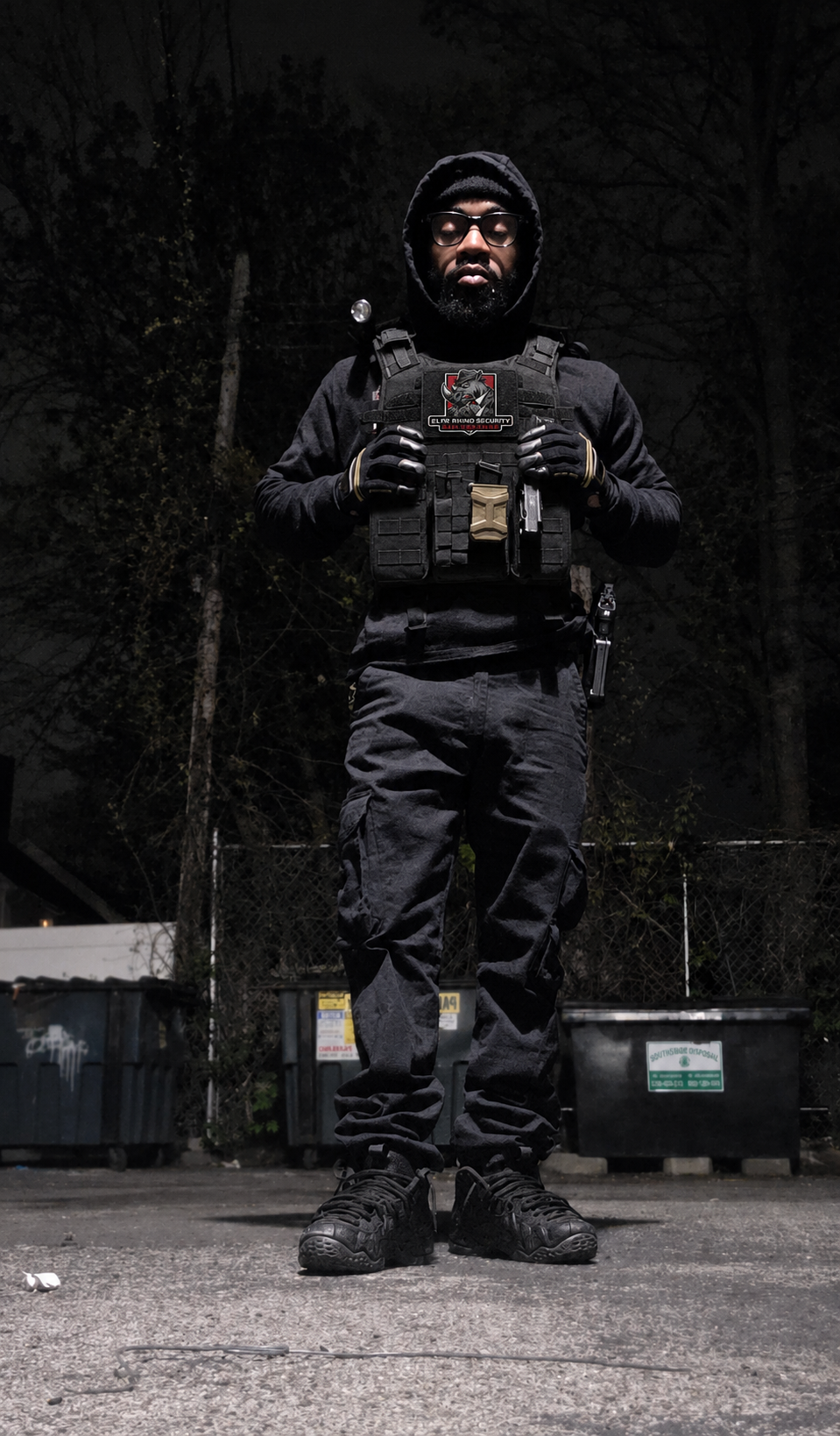 Elite Rhino Security guard in tactical gear with branded plate carrier