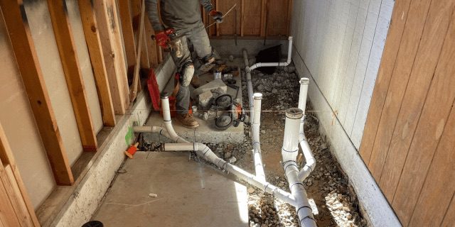 Hills Plumbing plumber diagnosing a service call in Redding California