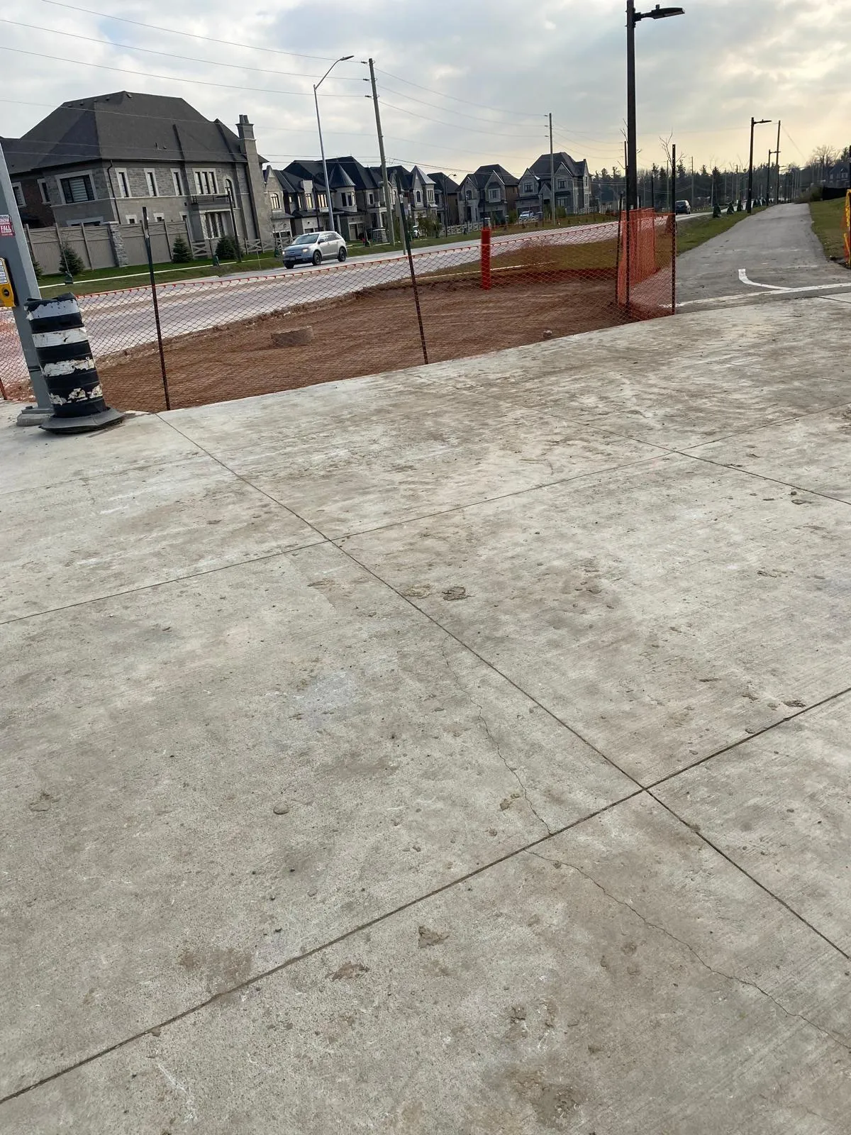 Heavy commercial paving, concrete curbs, walkways, aprons, parking area repairs, and asphalt resurfacing engineered for vehicular traffic.