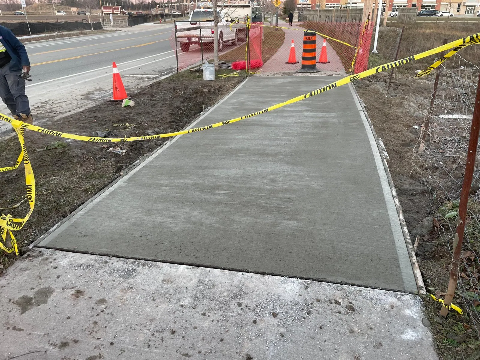 Finished concrete sidewalk replacement on a GTA site