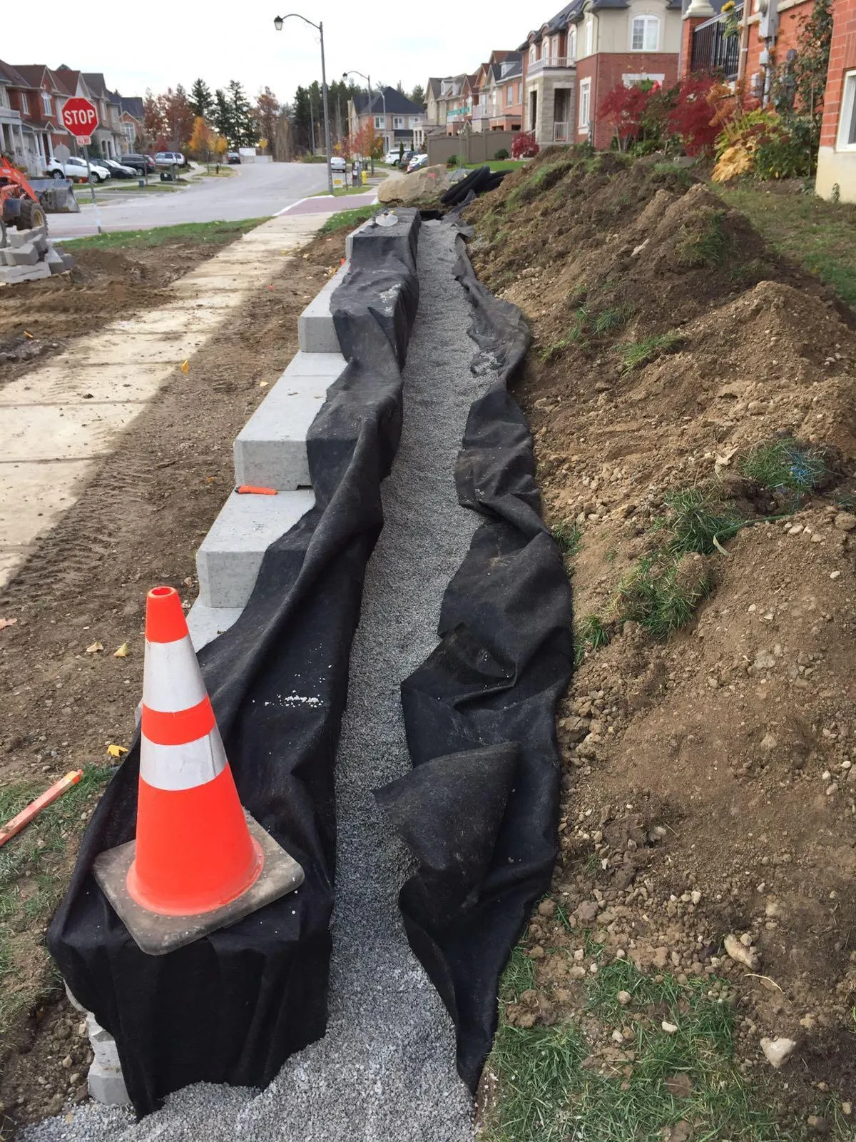 Tiered retaining wall and hardscape on a GTA development