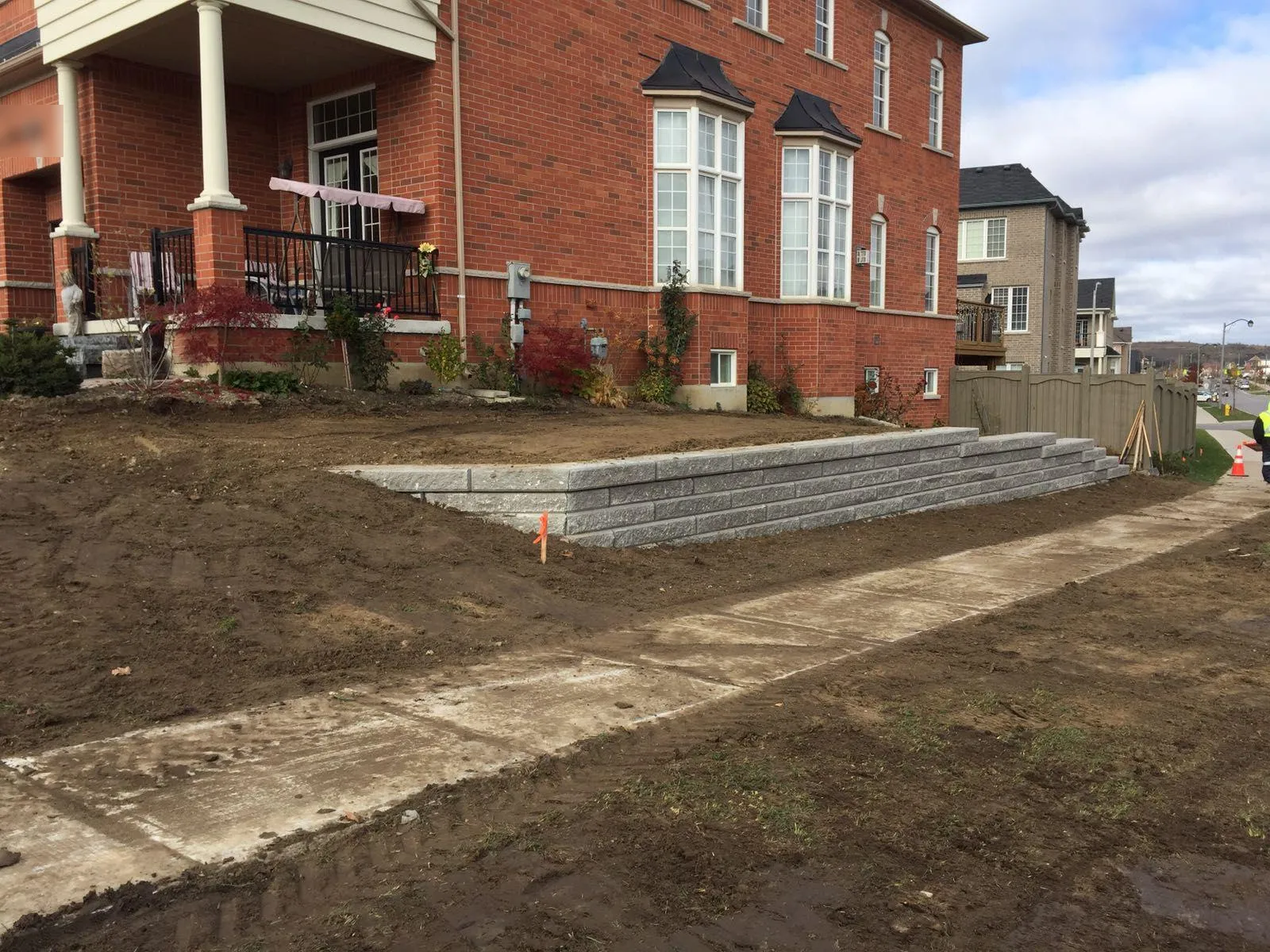 Paver installation with concrete curb border in the GTA