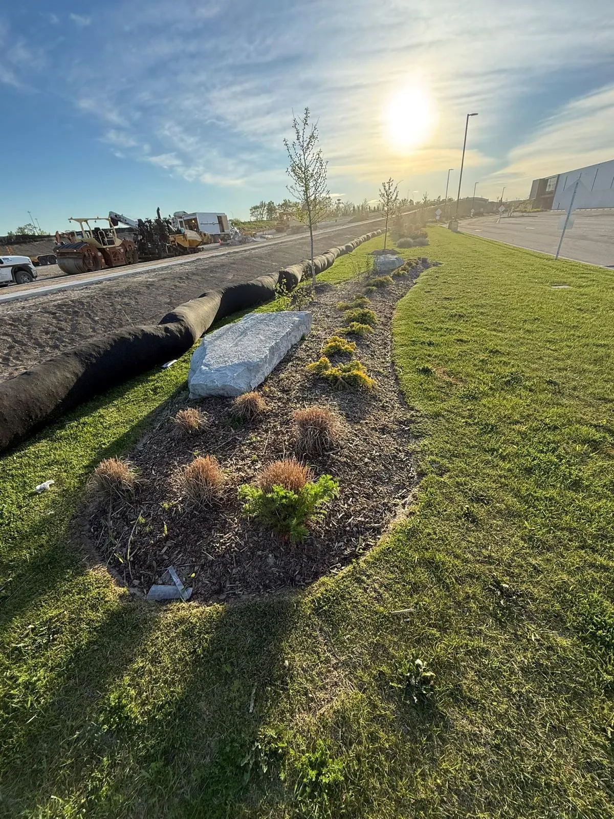 Pruning and bed care during scheduled commercial maintenance in the GTA