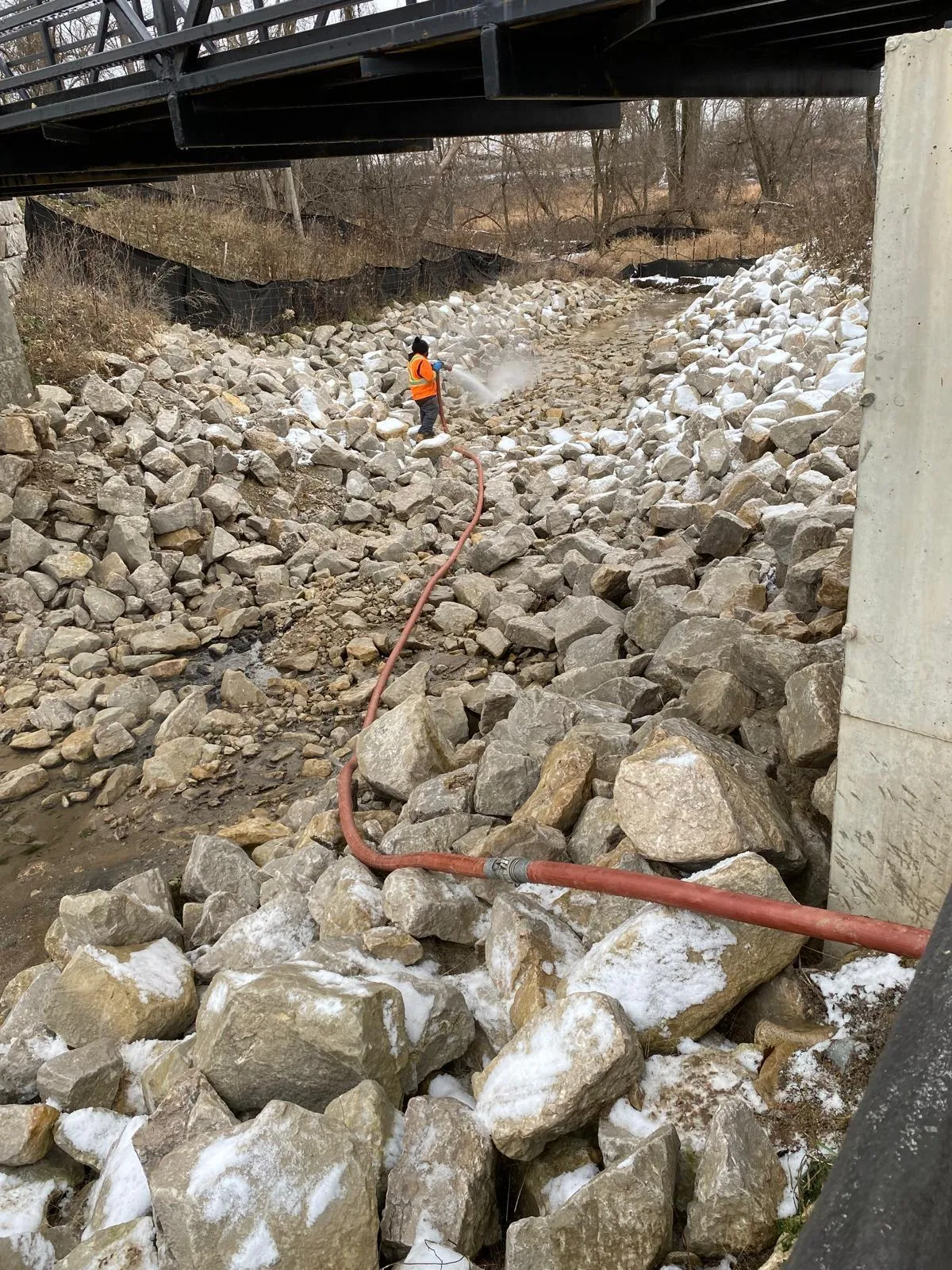 Stormwater management ponds, drainage channel excavation, rip-rap liner placement, and wetland restoration.