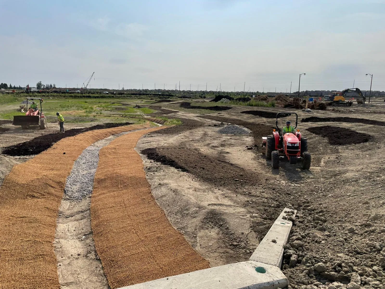 Engineered conveyance channel connecting to a stormwater pond in the GTA