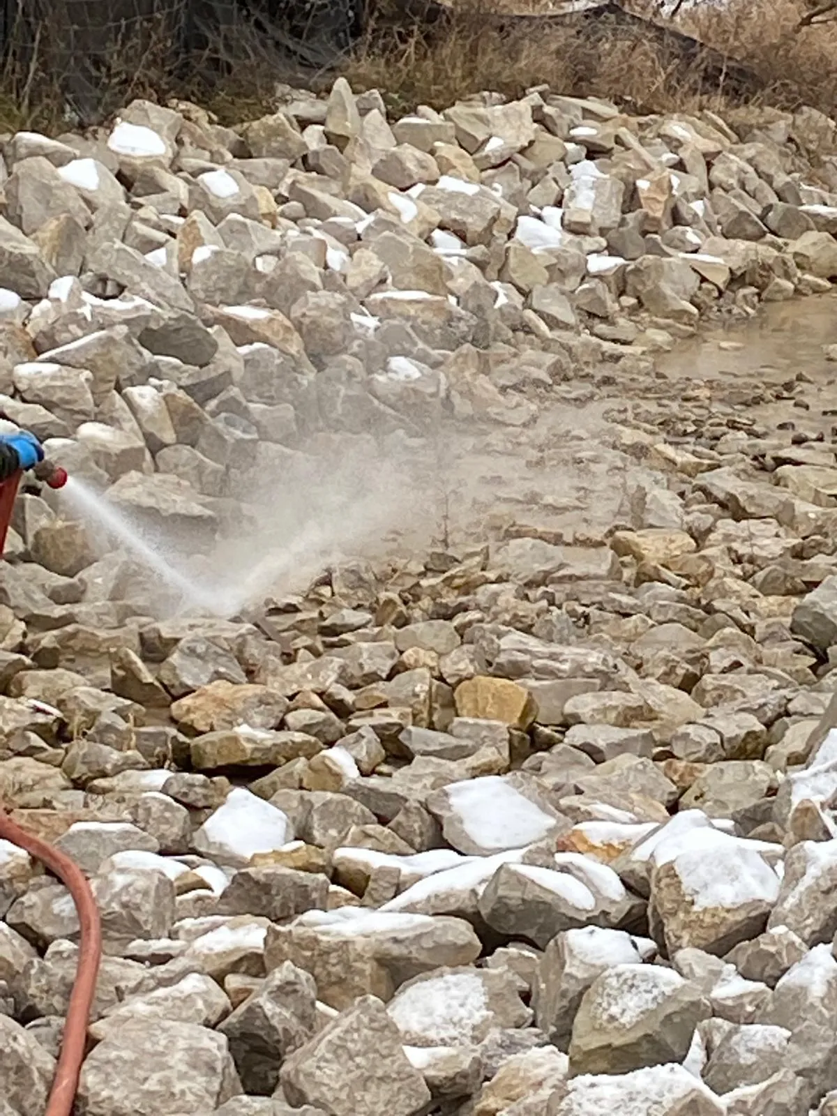 Open stormwater channel with rip-rap stabilization in the GTA
