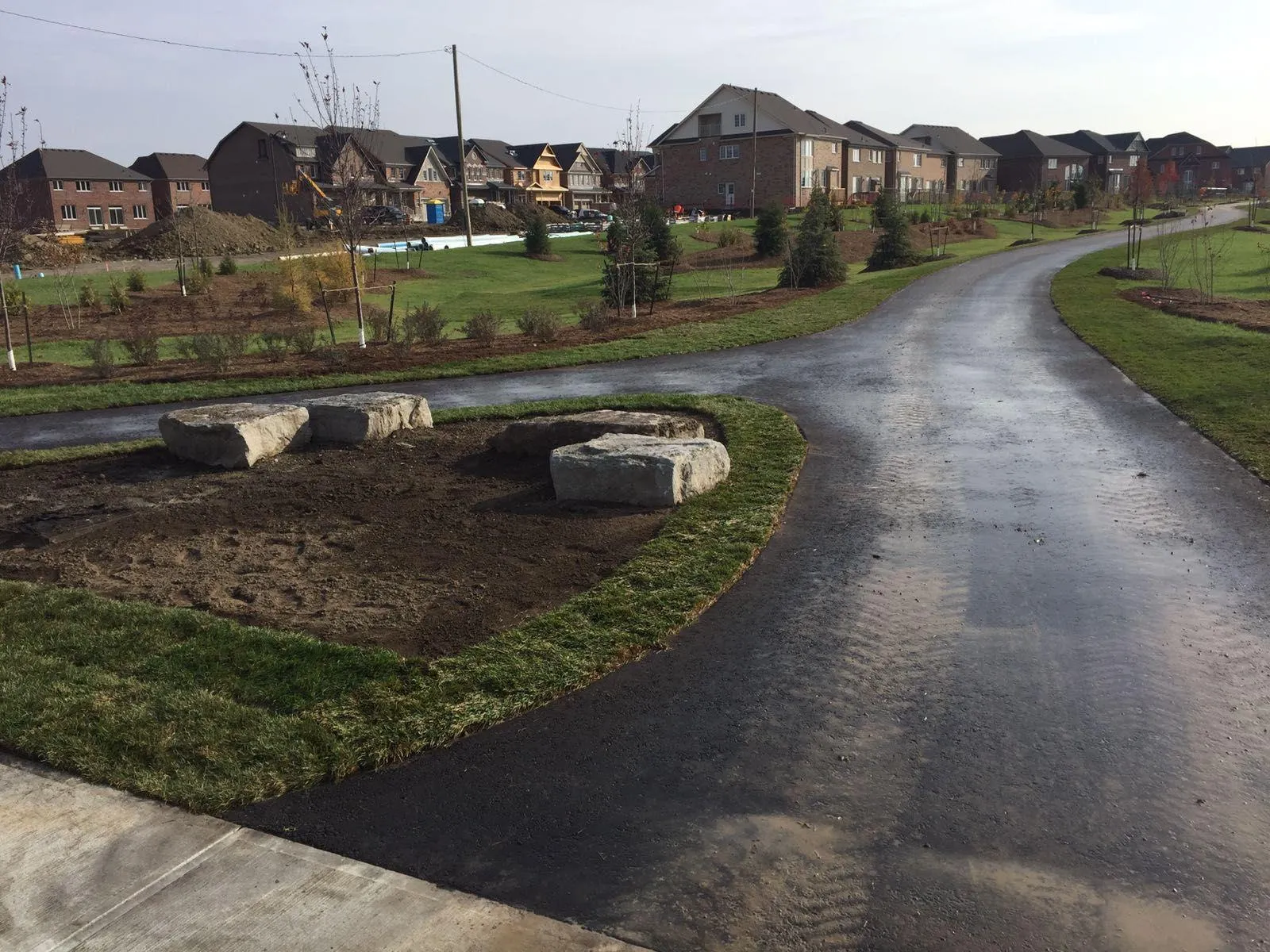 Wooded walking path with gravel surface in a GTA conservation area