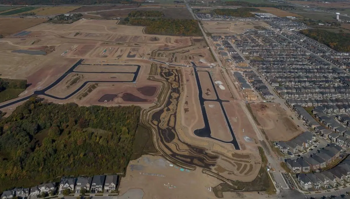 Rough grading and base preparation on a development site in the GTA