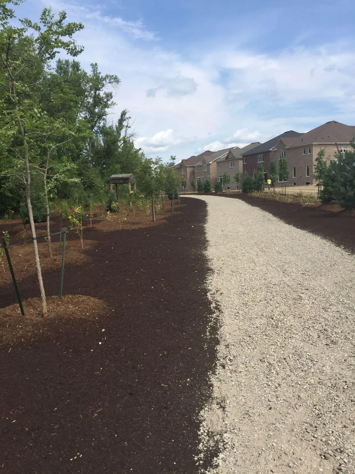 Multi-use asphalt trail connecting a GTA community to parkland