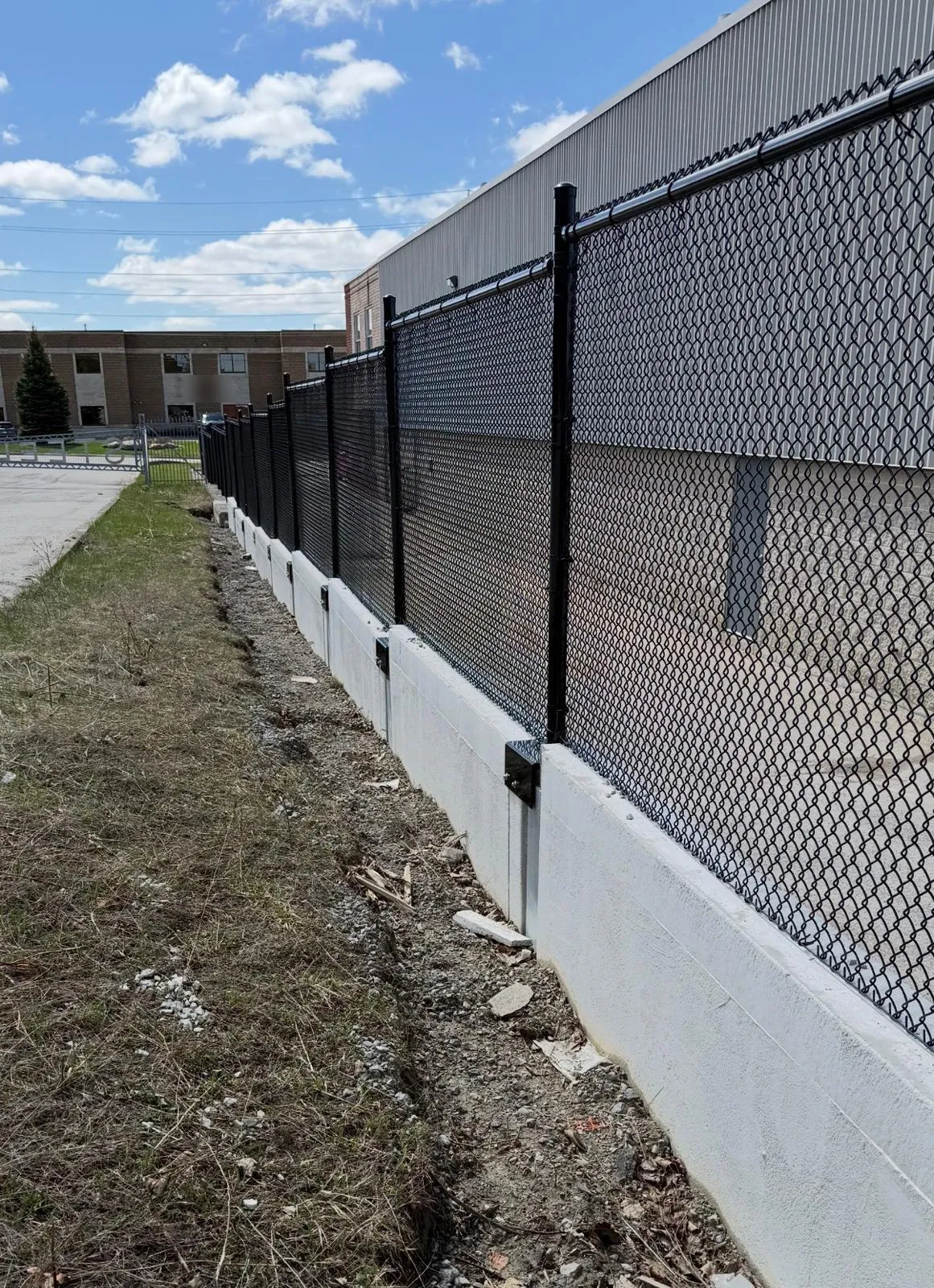 Installed fence line securing an industrial yard in the GTA
