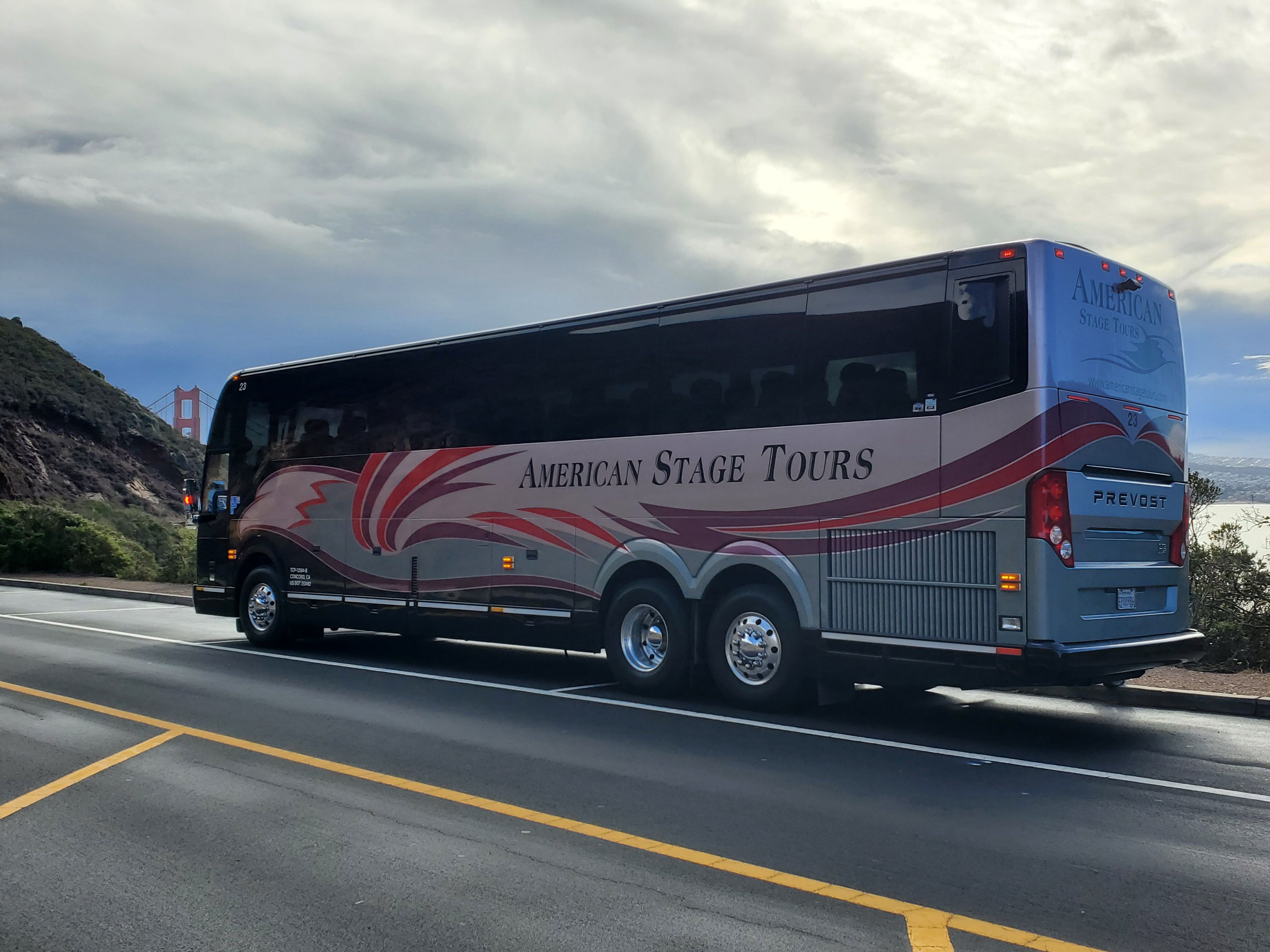 The 56 passenger motorcoach on the road.