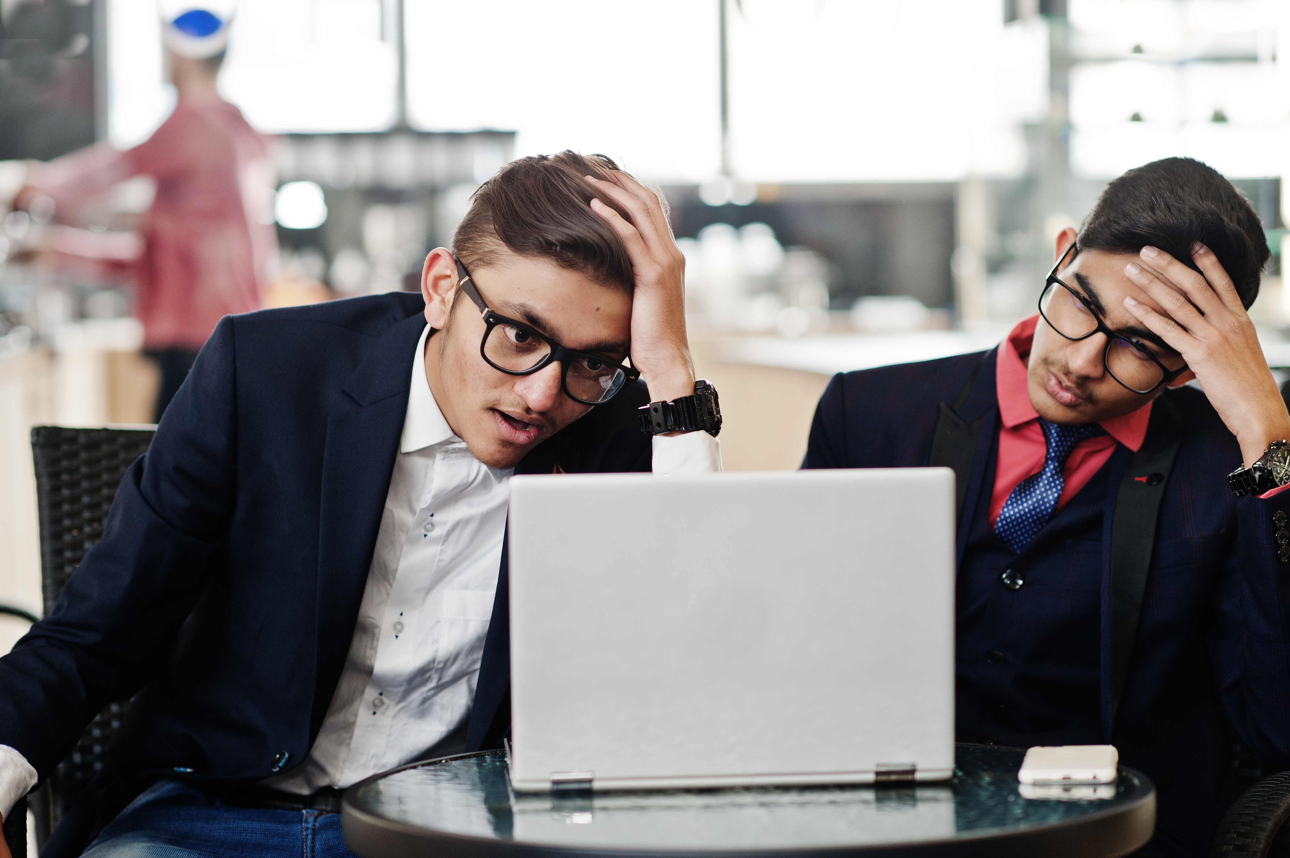 businessmen feeling stressed