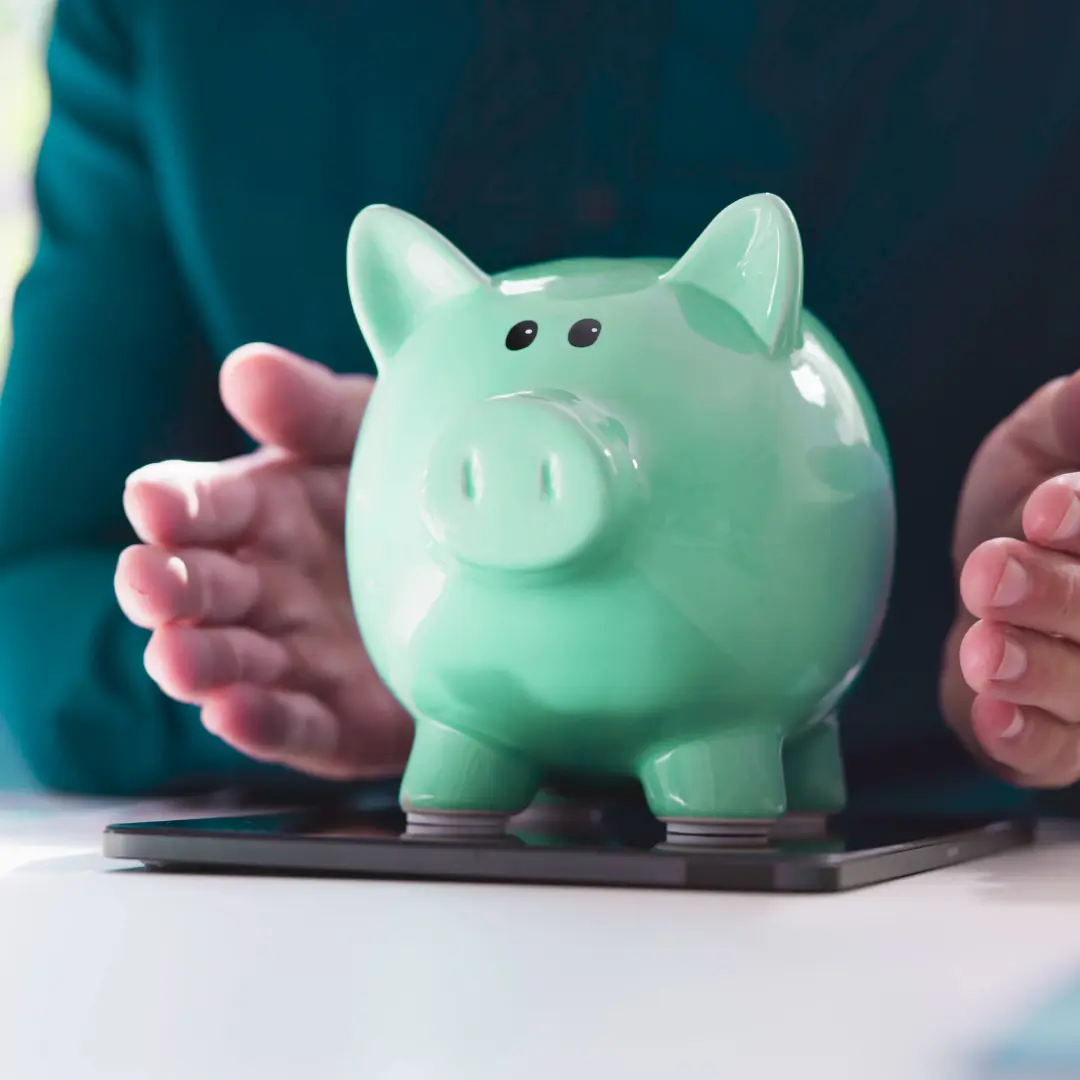 Self-employed person reviewing finances on a laptop