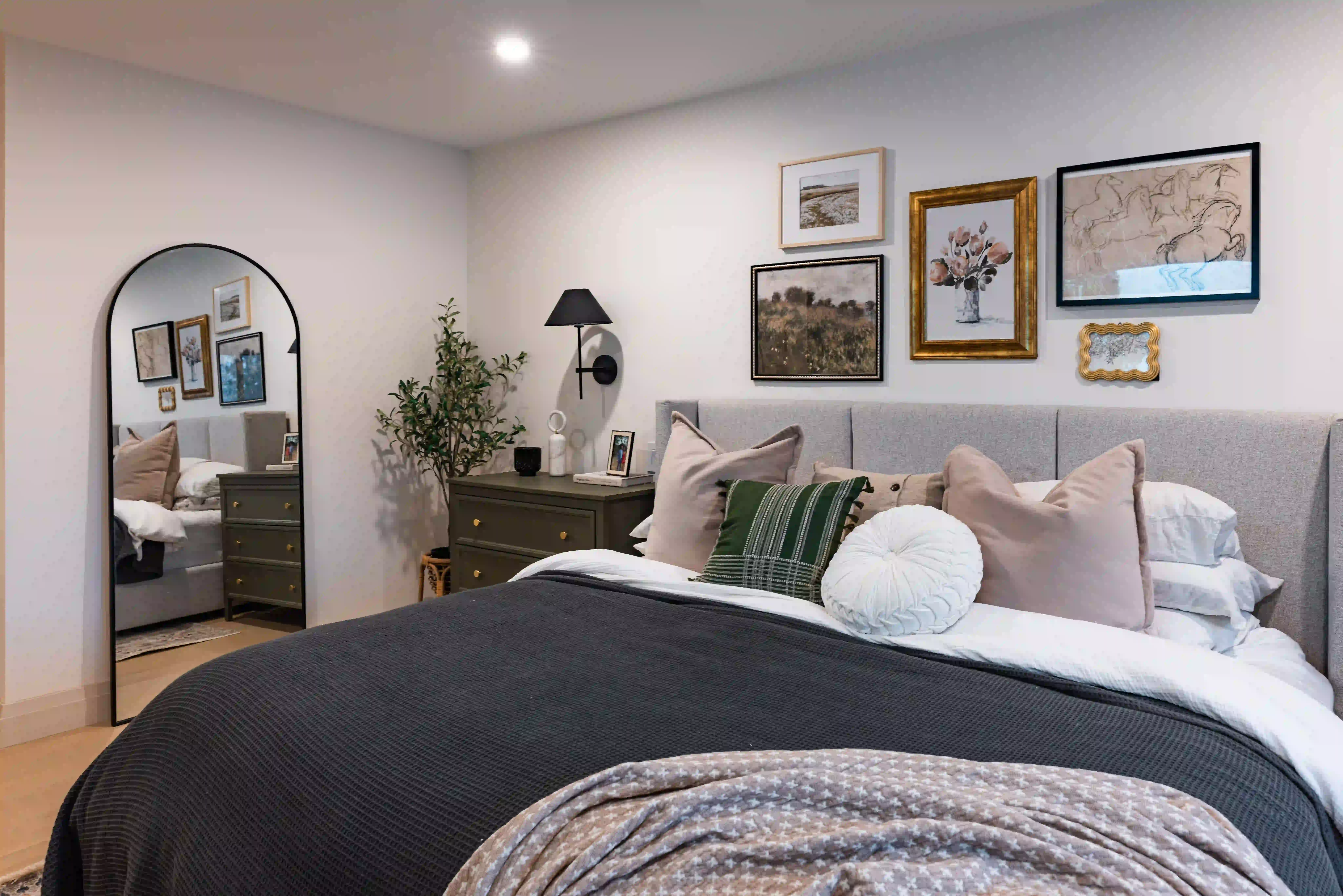 Primary bedroom at The White House with soft neutral styling