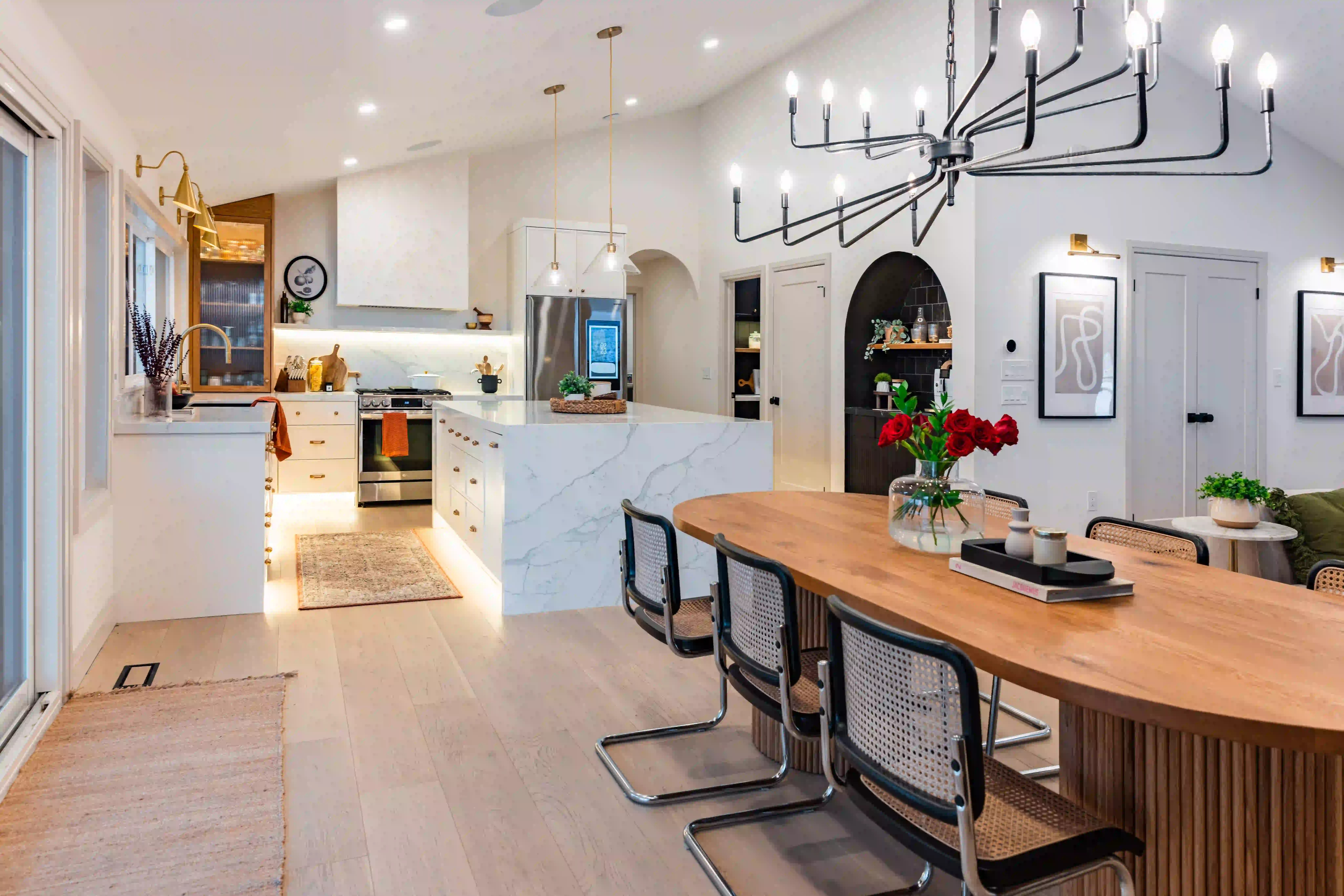 Dining table at The White House set within open concept interior