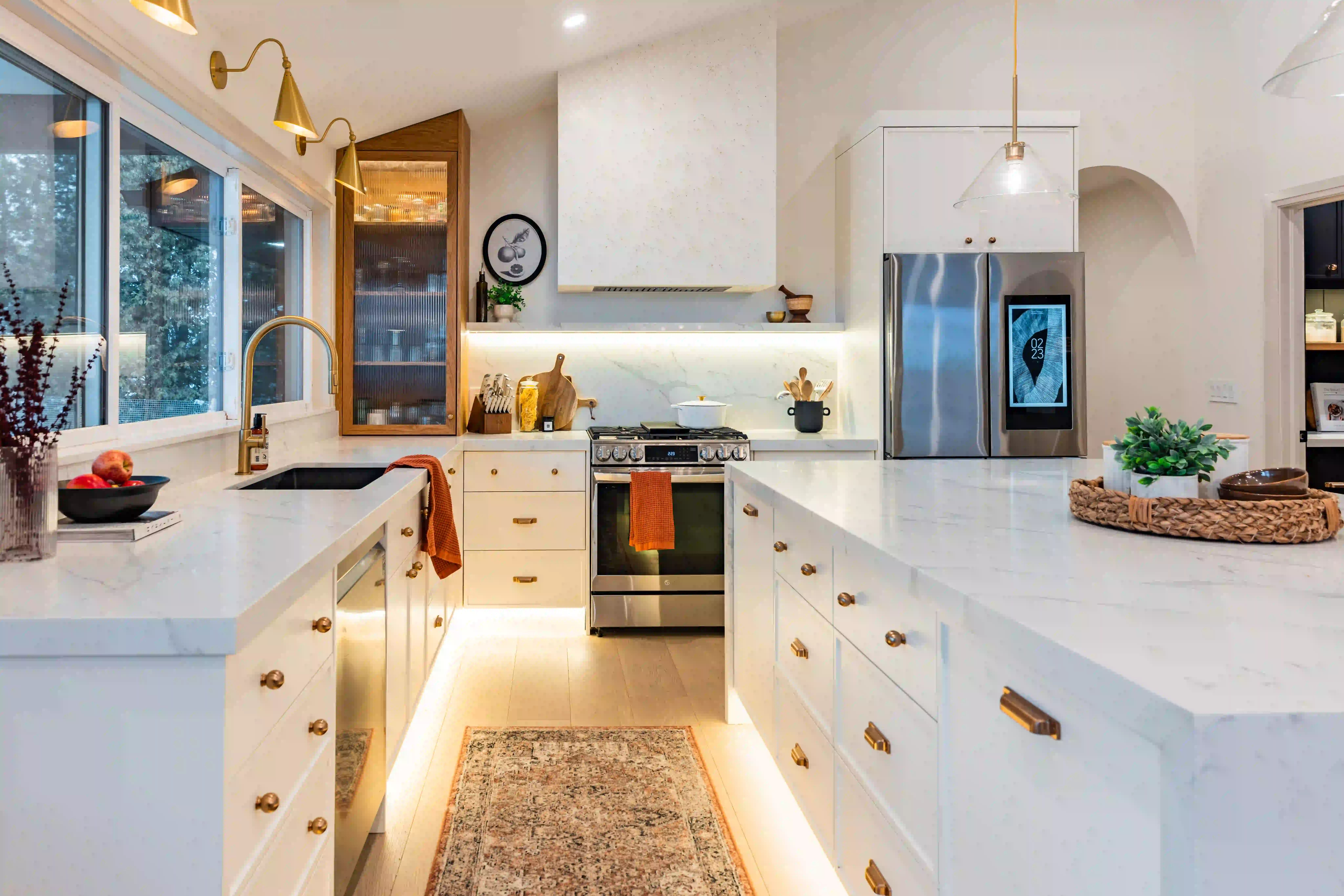 Full kitchen wide shot at The White House with large island and warm finishes